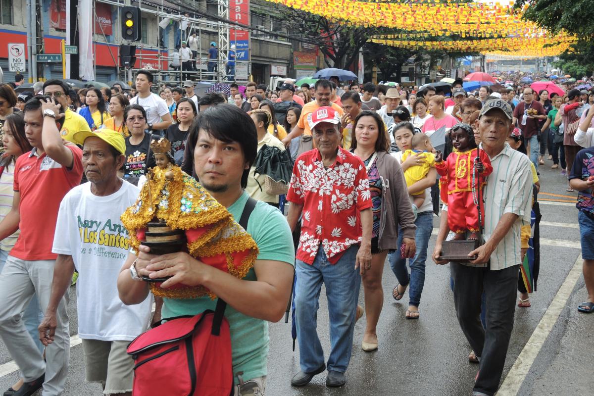 Devotees carry their own images of Santo Niño, which vary considerably.